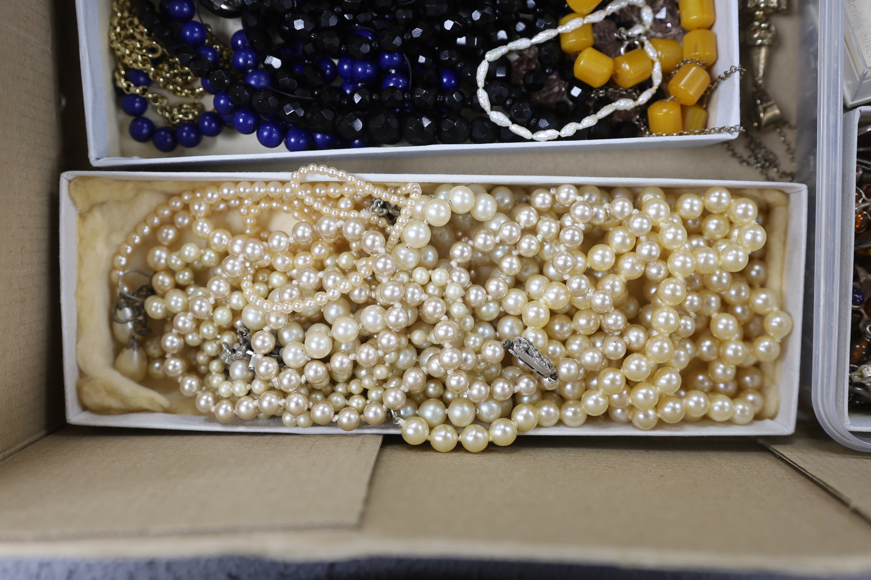 A quantity of assorted mainly costume jewellery including silver gilt and paste set articulated clown pendant on chain, etc.